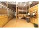 Spacious barn aisle with multiple horse stalls and tack storage at 9407 N Whitney Way, Monrovia, IN 46157