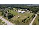 Aerial view of the entire property showcasing buildings and pastures at 9407 N Whitney Way, Monrovia, IN 46157