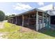 Row of outdoor horse stalls under covered shelter at 9407 N Whitney Way, Monrovia, IN 46157