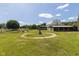 Round pen and barn in a grassy pasture area at 9407 N Whitney Way, Monrovia, IN 46157