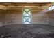 Empty horse stall with a green and white door at 9407 N Whitney Way, Monrovia, IN 46157