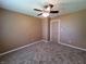 Simple bedroom with ceiling fan and door at 1096 Bumblebee Way, Greenfield, IN 46140