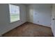 Well-lit bedroom with neutral walls and carpet at 1096 Bumblebee Way, Greenfield, IN 46140