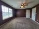 Spacious bedroom with ceiling fan and large window at 1096 Bumblebee Way, Greenfield, IN 46140