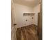 Laundry room with vinyl flooring and shelving at 1096 Bumblebee Way, Greenfield, IN 46140