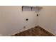 Functional laundry room with vinyl flooring and shelving at 1096 Bumblebee Way, Greenfield, IN 46140