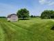 Large backyard with shed and mature trees at 1096 Bumblebee Way, Greenfield, IN 46140