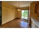 Bright dining area with hardwood floors and sliding glass doors at 1096 Bumblebee Way, Greenfield, IN 46140