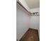 Shelved closet with wood rod for hanging clothes at 1096 Bumblebee Way, Greenfield, IN 46140