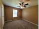 Simple bedroom with ceiling fan and window at 1096 Bumblebee Way, Greenfield, IN 46140