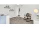 Bedroom with rocking chair, crib, and plenty of natural light at 3422 Wetherby Pl, Danville, IN 46122
