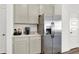 Kitchen with stainless steel refrigerator and ample counter space at 3422 Wetherby Pl, Danville, IN 46122