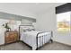 Charming bedroom with metal bed frame and wood dresser at 3422 Wetherby Pl, Danville, IN 46122