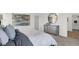 Comfortable bedroom with a neutral color scheme and large artwork at 3422 Wetherby Pl, Danville, IN 46122