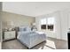 Bedroom with light-blue bedding and textured wallcovering at 3422 Wetherby Pl, Danville, IN 46122