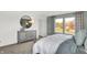 Bright bedroom with a dresser and large windows at 3422 Wetherby Pl, Danville, IN 46122