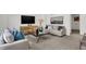Spacious living room with a neutral color palette and comfy seating at 3422 Wetherby Pl, Danville, IN 46122
