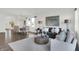 Spacious living room features comfortable seating and large windows at 3422 Wetherby Pl, Danville, IN 46122
