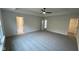 Spacious primary bedroom with carpet flooring and access to bathroom and closet at 6272 Willow Branch Way, Plainfield, IN 46168