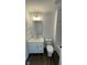 Well-lit bathroom with single vanity and a tub at 6272 Willow Branch Way, Plainfield, IN 46168
