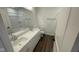 Bathroom boasts double vanity and a soaking tub at 6272 Willow Branch Way, Plainfield, IN 46168