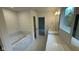 Spa-like bathroom with soaking tub and double vanity at 6272 Willow Branch Way, Plainfield, IN 46168