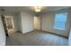 Spacious bedroom with a large window and closet at 6272 Willow Branch Way, Plainfield, IN 46168