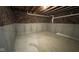 Unfinished basement with concrete floor and exposed utilities at 6272 Willow Branch Way, Plainfield, IN 46168