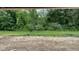 View of wooded backyard from under construction home at 6272 Willow Branch Way, Plainfield, IN 46168