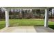 Spacious backyard with grassy area and wooded backdrop at 6272 Willow Branch Way, Plainfield, IN 46168