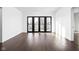 Spacious bedroom with hardwood floors and large windows at 855 N East St # 205, Indianapolis, IN 46202