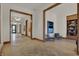 Elegant lobby with herringbone floors, modern art, and comfortable seating at 855 N East St # 205, Indianapolis, IN 46202