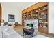 Elegant living room with a marble fireplace, built-in shelving, and comfortable seating at 855 N East St # 205, Indianapolis, IN 46202