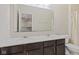 Double vanity bathroom with a large mirror reflecting a hallway at 2377 Chandler Way, Greenwood, IN 46143