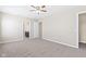 Bright bedroom with ceiling fan and closet at 2377 Chandler Way, Greenwood, IN 46143