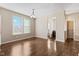 Bright dining area with hardwood floors and pantry access at 2377 Chandler Way, Greenwood, IN 46143