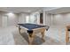 Finished basement game room, including a pool table at 13811 Driftwood Dr, Carmel, IN 46033