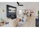 Open living room with a modern fireplace and kitchen views at 1544 Hoyt Ave, Indianapolis, IN 46203