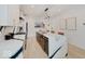 Modern kitchen featuring a large island with marble countertops at 1544 Hoyt Ave, Indianapolis, IN 46203