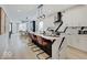 Open concept kitchen with marble countertops and modern appliances at 1544 Hoyt Ave, Indianapolis, IN 46203