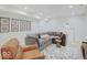 Finished basement Gathering room, featuring a sectional sofa and a large TV at 1544 Hoyt Ave, Indianapolis, IN 46203