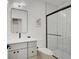 Clean bathroom with a walk-in shower and white subway tiles at 1544 Hoyt Ave, Indianapolis, IN 46203