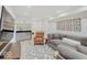 Spacious basement recreation area with comfortable seating at 1544 Hoyt Ave, Indianapolis, IN 46203