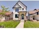Modern farmhouse exterior with a welcoming front porch at 1544 Hoyt Ave, Indianapolis, IN 46203