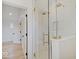 Spa-like bathroom with a walk-in shower and herringbone tile at 1544 Hoyt Ave, Indianapolis, IN 46203