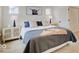 Spacious primary bedroom with a king-size bed and light flooring at 1544 Hoyt Ave, Indianapolis, IN 46203