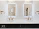 Modern bathroom with double vanity and LED backlit mirrors at 1544 Hoyt Ave, Indianapolis, IN 46203
