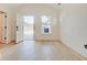 Bedroom with hardwood floors and access to deck at 1544 Hoyt Ave, Indianapolis, IN 46203