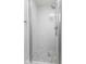 Clean and modern walk-in shower with hexagon tile at 249 N Beville Ave, Indianapolis, IN 46201