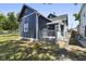 Blue house with wooden deck and playground view at 249 N Beville Ave, Indianapolis, IN 46201